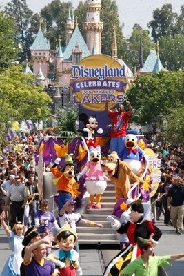 ANAHEIM, CA - JUNE 18:  In this handout provided by Disney, Lakers star and NBA Finals MVP Kobe Bryant waves to thousands of fans during a parade celebrating the 2009 World Champion Los Angeles Lakers at Disneyland on June 18, 2009 in Anaheim, California.