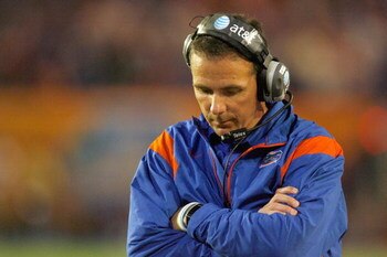 MIAMI - JANUARY 08:  Head coach Urban Meyer of the Florida Gators walks on the sidelines against the Oklahoma Sooners during the FedEx BCS National Championship Game at Dolphin Stadium on January 8, 2009 in Miami, Florida.  (Photo by Eliot J. Schechter/Ge