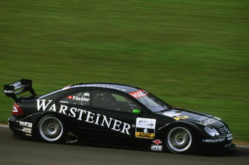 DONINGTON - MAY 19:  Warsteiner AMG Mercedes driver Marcel Fassler in action during the DTM German Touring Car Championship race held at Donington Park, in England on May 19, 2002. (Photo by: Bryn Lennon/Getty Images)