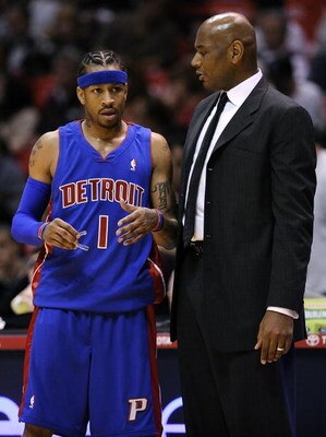 EAST RUTHERFORD, NJ - NOVEMBER 07:  Allen Iverson #1 talks with head coach Michael Curry of the Detroit Pistons during a game against the New Jersey Nets November 7, 2008 at the Izod Arena in East Rutherford, New Jersey.  (Photo by Jeff Zelevansky/Getty I