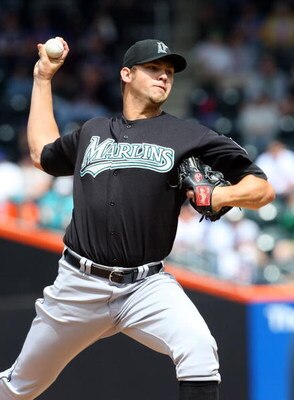 NEW YORK - APRIL 29:  Josh Johnson #55 of the Florida Marlins throws a pitch against the New York Mets on April 29, 2009 at Citi Field in the Flushing neighborhood of the Queens borough of New York City. The Marlins defeated the Mets 4-3.  (Photo by Jim M