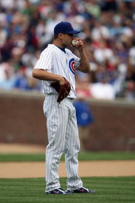 CHICAGO - MAY 29:  Ted Lilly #30 of the Chicago Cubs stands on the field against the Los Angeles Dodgers during the game on May 29, 2009 at Wrigley Field in Chicago, Illinois. (Photo by Jonathan Daniel/Getty Images) 