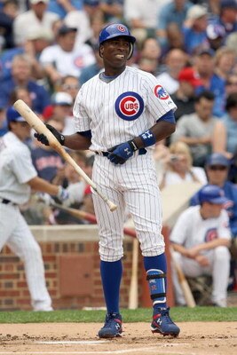 CHICAGO - JUNE 17: Alfonso Soriano #12 of the Chicago Cubs reacts after striking out during the game against the Chicago White Sox on June 17, 2009 at Wrigley Field in Chicago, Illinois. (Photo by Jonathan Daniel/Getty Images) 