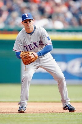 DETROIT - APRIL 10:  Michael Young #10 of the Texas Rangers gets ready infield against the Detroit Tigers during Opening Day on April 10, 2009 at Comerica Park in Detroit, Michigan. Detroit won the game 15-2. (Photo by Gregory Shamus/Getty Images)