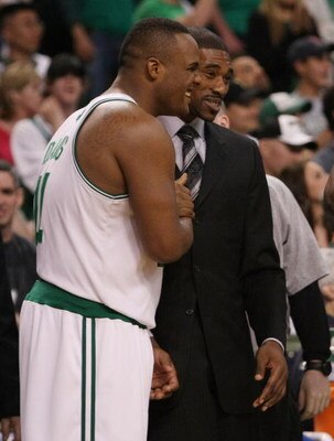 BOSTON - MAY 02:  Glen Davis #11 and Leon Powe #0 of the Boston Celtics celebrate the win over the Chicago Bulls in Game Seven of the Eastern Conference Quarterfinals during the 2009 NBA Playoffs at TD Banknorth Garden on May 2, 2009 in Boston, Massachuse