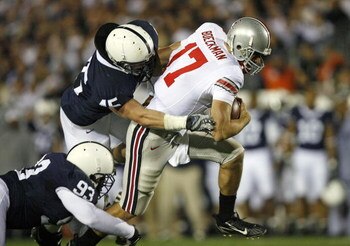 UNIVERSITY PARK, PA - OCTOBER 27: Quarterback Todd Boeckman #17 of the Ohio State Buckeyes is tackled by linebacker Sean Lee #45 of the Penn State Nittany Lions during a game at Beaver Stadium on October 27, 2007 in University Park, Pennsylvania. Ohio Sta