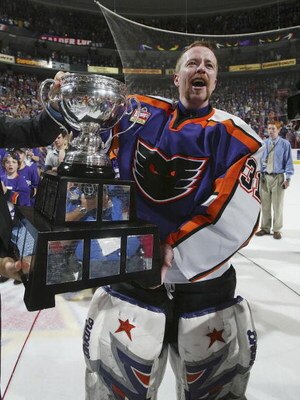 PHILADELPHIA - JUNE 10: Neil Little #31 of the Philadelphia Phantoms celebrates with the Calder Cup after the Phantoms defeated the Chicago Wolves 5-2 to sweep the series at the Wachovia Center on June 10, 2005 in Philadelphia, Pennsylvania. (Photo by Bru