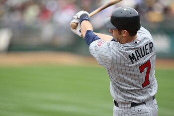 OAKLAND, CA - JUNE 11:  Joe Mauer #7 of the Minnesota Twins bats against the Oakland Athletics during a Major League Baseball game on June 11, 2009 at the Oakland Coliseum in Oakland, California.  (Photo by Jed Jacobsohn/Getty Images)