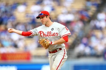 LOS ANGELES, CA - JUNE 06:  Chase Utley #26 of the Philadelphia Phillies fields against the Los Angeles Dodgers at Dodger Stadium on June 6, 2009 in Los Angeles, California. The Dodgers defeated the Phillies 3-2 in 12 innings.  (Photo by Jeff Gross/Getty 