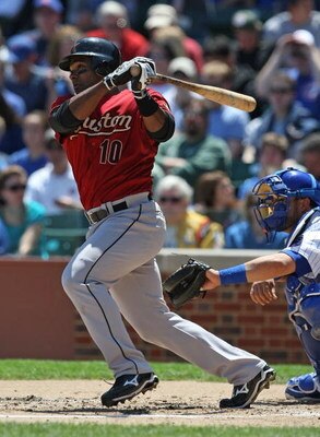 CHICAGO - MAY 16: Miguel Tejada #10 of the Houston Astros hits the ball against the Chicago Cubs on May 16, 2009 at Wrigley Field in Chicago, Illinois. The Cubs defeated the Astros 5-4. (Photo by Jonathan Daniel/Getty Images)