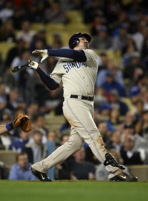 LOS ANGELES - JUNE 10:  Adrian Gonzalez #23 of the San Diego Padres bats against the Los Angeles Dodgers on June 10, 2009 at Dodger Stadium in Los Angeles, California.  The Padres won 3-1. (Photo by Stephen Dunn/Getty Images)