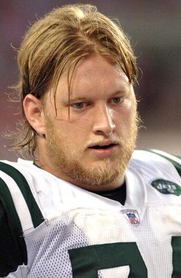 New York Jets  # 74 center Nick Mangold  on the sidelines during the NFL Preseason game between  New York Jets vs Tampa Bay Buccaneers on August 11, 2006 at Raymond James Stadium, Tampa, Florida  (Photo by Al Messerschmidt/Getty Images)