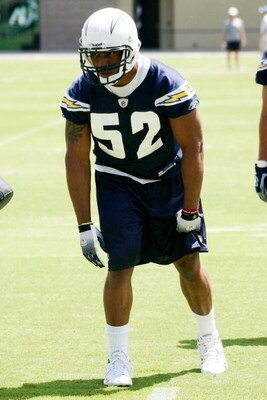 SAN DIEGO - MAY 03: Linebacker Larry English #52 of the San Diego Chargers prepares to pass rush during a drill at minicamp practice at the team's training facility on May 3, 2009 in San Diego, California. (Photo by Kevin Terrell/Getty Images)