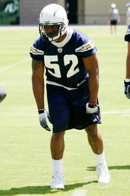 SAN DIEGO - MAY 03: Linebacker Larry English #52 of the San Diego Chargers prepares to pass rush during a drill at minicamp practice at the team's training facility on May 3, 2009 in San Diego, California. (Photo by Kevin Terrell/Getty Images)