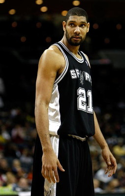 CHARLOTTE, NC - JANUARY 19:  Tim Duncan #21 of the San Antonio Spurs reacts against the Charlotte Bobcats during their game at Time Warner Cable Arena on January 19, 2009 in Charlotte, North Carolina.  (Photo by Streeter Lecka/Getty Images)