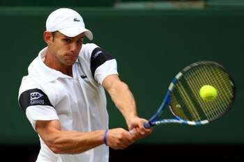 WIMBLEDON, ENGLAND - JULY 03:  Andy Roddick of USA plays a backhand during the men's singles semi final match against Andy Murray of Great Britain on Day Eleven of the Wimbledon Lawn Tennis Championships at the All England Lawn Tennis and Croquet Club on 