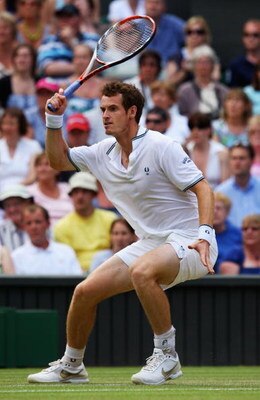 WIMBLEDON, ENGLAND - JULY 03:  Andy Murray of Great Britain in action during the men's singles semi final match against Andy Roddick of USA on Day Eleven of the Wimbledon Lawn Tennis Championships at the All England Lawn Tennis and Croquet Club on July 3,