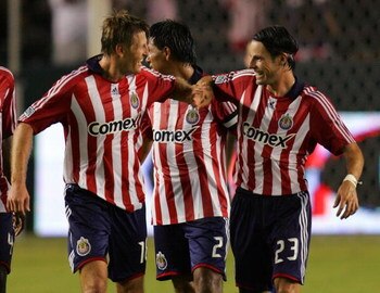 CARSON, CA - SEPTEMBER 27:  Alex Zotinca #23 and Sasha Victorine #18 of CD Chivas USA celebrate Victorine's first half strike to make the score 2-0 against  the Kansas City Wizards during their MLS match at The Home Depot Center on September 27, 2008 in C