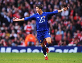 LONDON, ENGLAND - MAY 05:  Cristiano Ronaldo of Manchester United celebrates scoring the second goal of the game during the UEFA Champions League Semi Final Second Leg match between Arsenal and Manchester United at Emirates Stadium on May 5, 2009 in Londo