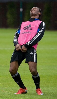 COBHAM, ENGLAND - MAY 27:  Didier Drogba laughs during the Chelsea Football Club Training Session held at their Cobham Training Ground on May 27, 2009 in Cobham, England.  (Photo by Christopher Lee/Getty Images)