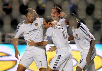 CARSON, CA - MAY 30:  (L-R) Chris Klein #7, Landon Donovan #10, Todd Dunivant #2 and Edson Buddle #14 of the Los Angeles Galaxy celebrate after Buddle's goal late in the second half to draw even at 1-1 against the Kansas City Wizards during the MLS match 