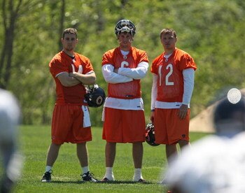 LAKE FOREST, IL - MAY 20: (L-R) Quarterbacks Brett Basanez #14, Jay Cutler #6 and Caleb Hanie #12 of the Chicago Bears watch a kicking drill during an organized team activity (OTA) practice on May 20, 2009 at Halas Hall in Lake Forest, Illinois. (Photo by