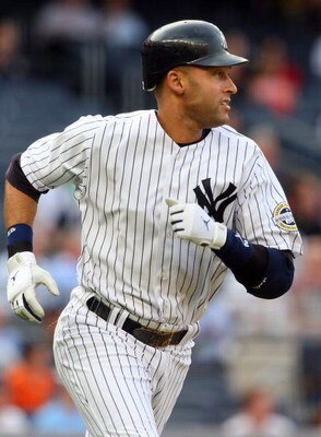 NEW YORK - JULY 01:  Derek Jeter #2 of the New York Yankees runs against the Seattle Mariners on July 1, 2009 at Yankee Stadium in the Bronx borough of New York City.  (Photo by Jim McIsaac/Getty Images)