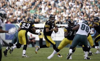 PHILADELPHIA - SEPTEMBER 21: Ben Roethlisberger #7 of the Pittsburgh Steelers is chased out of the pocket during the first half of their game against the Philadelphia Eagles on September 21, 2008 at Lincoln Financial Field in Philadelphia, Pennsylvania. T