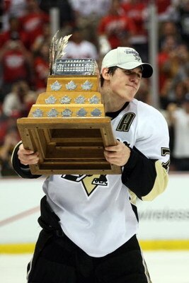DETROIT - JUNE 12:  Evgeni Malkin #71 of the Pittsburgh Penguins wins the MVP after a 2-1 win over the Detroit Red Wings during Game Seven of the 2009 NHL Stanley Cup Finals at Joe Louis Arena on June 12, 2009 in Detroit, Michigan.  (Photo by Bruce Bennet