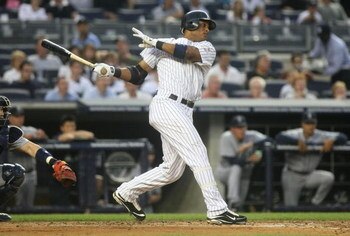 NEW YORK - JULY 2: Robinson Cano #24 of the New York Yankees bats against the Seattle Mariners at Yankee Stadium on July 2, 2009 in the Bronx borough of New York City.  (Photo by Nick Laham/Getty Images)