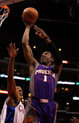 LOS ANGELES, CA - JANUARY 11: Amare Stoudemire #1 of the Phoenix Suns shoots over Brian Skinner #8 of the Los Angeles Clippers on January 11, 2009 at Staples Center in Los Angeles, California.  NOTE TO USER: User expressly acknowledges and agrees that, by