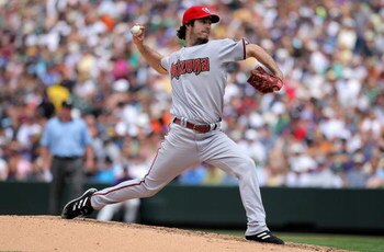 DENVER - JULY 05:  Starting pitcher Dan Haren #15 of the Arizona Diamondbacks delivers against the Colorado Rockies during MLB action at Coors Field on July 5, 2009 in Denver, Colorado. Haren earned the win as the Diamondbacks defeated the Rockies 4-3.  (