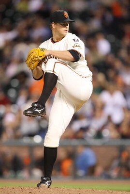 SAN FRANCISCO - AUGUST 28:   Pitcher Matt Cain #18 of the San Francisco Giants pitches during the game against the Colorado Rockies during a Major League Baseball game on August 28, 2007 at AT&T Park in San Francisco, California.   (Photo by Lisa Blumenfe