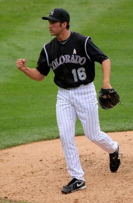 DENVER - MAY 10:  Relief pitcher Huston Street #16 of the Colorado Rockies reacts after striking out Jeremy Hermida of the Florida Marlins for the final out of the game during MLB action at Coors Field on May 10, 2009 in Denver, Colorado. Street earned a 