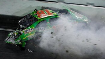 DAYTONA BEACH, FL - JULY 04:  Kyle Busch, driver of the #18 Interstate Batteries Toyota, crashes on the final lap during the NASCAR Sprint Cup Series 51st Annual Coke Zero 400 at Daytona International Speedway on July 4, 2009 in Daytona Beach, Florida.  (