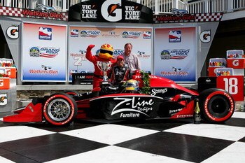WATKINS GLEN, NY - JULY 05:  Justin Wilson driver of the #18 Z-Line Design Dale Coyne Racing Dallara Honda celebrates with his team owner Dale Coyne after the teams first ever victory at the IRL IndyCar Series Camping World Grand Prix at The Glen on July 