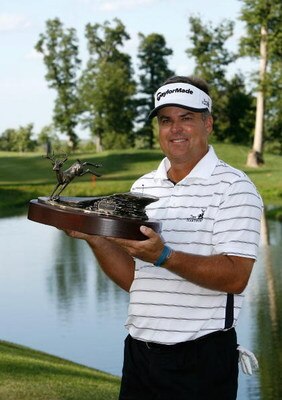 SILVIS, IL - JULY 13:  Kenny Perry poses with the trophy after winning the 2008 John Deere Classic at TPC at Deere Run on Sunday, July 13, 2008 in Silvis, Illinois.  (Photo by Kevin C. Cox/Getty Images)