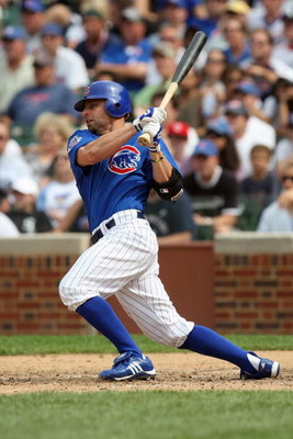 CHICAGO - JUNE 18: Reed Johnson #9 of the Chicago Cubs bats against the Chicago White Sox during the game on June 18, 2009 at Wrigley Field in Chicago, Illinois. (Photo by Jonathan Daniel/Getty Images)