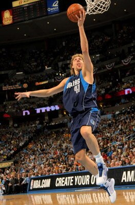 DENVER - MAY 03:  Dirk Nowitzki #41 of the Dallas Mavericks lays up a shot against the Denver Nuggets in Game One of the Western Conference Semifinals during the 2009 NBA Playoffs at Pepsi Center on May 3, 2009 in Denver, Colorado. NOTE TO USER: User expr