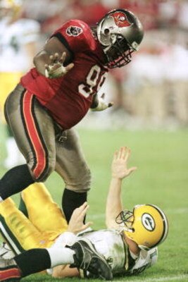 12 Nov 2000:  Warren Sapp # 99 of the Tampa Bay Buccaneers taunts Matt Hassselbeck # 11 of the Green Bay Packers after getting a pass off in the fourth quarter at Raymond James Stadium in Tampa, Florida. Mandatory Credit: Eliot Schechter/ALLSPORT