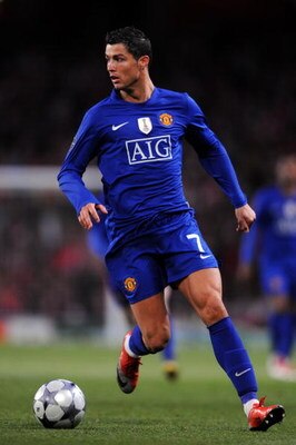 LONDON, ENGLAND - MAY 05:  Cristiano Ronaldo of Manchester United runs with the ball during the UEFA Champions League Semi Final Second Leg match between Arsenal and Manchester United at Emirates Stadium on May 5, 2009 in London, England.  (Photo by Shaun