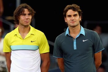 MADRID, SPAIN - MAY 17:  Roger Federer of Switzerland (R) and Rafael Nadal of Spain during the prize giving ceremony after the mens final during the Madrid Open tennis tournament at the Caja Magica on May 17, 2009 in Madrid, Spain.  (Photo by Clive Brunsk