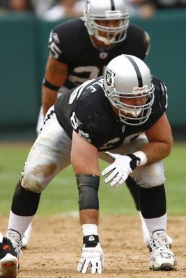 OAKLAND, CA - SEPTEMBER 23:  Guard Cooper Carlisle #66 of the Oakland Raiders is set in a three-point stance against the Cleveland Browns during a 26-24 win at McAfee Coliseum on September 23, 2007 in Oakland, California.  (Photo by Kevin Terrell/Getty Im