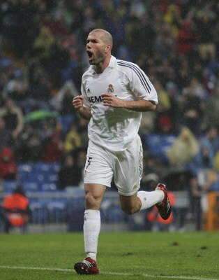 MADRID, SPAIN - JANUARY 15:  Zinedine Zidane of Real Madrid celebrates his goal during a Primera Liga match between Real Madrid and Sevilla at the Santiago Bernabeu stadium on January 15, 2006 in Madrid, Spain.  (Photo by Denis Doyle/Getty Images) 