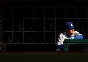 ANAHEIM, CA - JUNE 21:  Manager Joe Torre of the Los Angeles Dodgers  looks on from the dugout during the game with the Los Angeles Angels of Anaheim on June 21, 2009 at Angel Stadium in Anaheim, California.   The Dodgers won 5-3.  (Photo by Stephen Dunn/