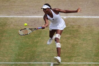 WIMBLEDON, ENGLAND - JULY 04:  Venus Williams of USA plays a forehand during the women's singles final match against Serena Williams of USA on Day Twelve of the Wimbledon Lawn Tennis Championships at the All England Lawn Tennis and Croquet Club on July 4,