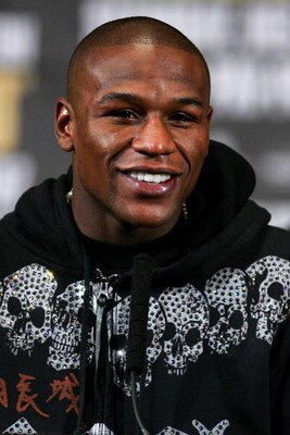 LAS VEGAS - DECEMBER 08:  Floyd Mayweather Jr. speaks during his post fight news conference after knocking out Ricky Hatton of England in the 10th round after their WBC world welterweight championship fight at the MGM Grand Garden Arena on December 8, 200