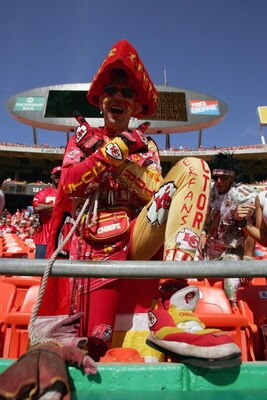 KANSAS CITY, MO - OCTOBER 1:  A Kansas City Chiefs fan cheers during the game against the San Francisco 49ers at Arrowhead Stadium on October 1, 2006 in Kansas City, Missouri. The Chiefs defeated the Niners 41-0.  (Photo by Doug Pensinger/Getty Images)