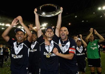MELBOURNE, AUSTRALIA - FEBRUARY 28:  Melbourne Victory players celebrate victory in the A-League Grand Final match between the Melbourne Victory and Adelaide United at the Telstra Dome on February 28, 2009 in Melbourne, Australia.  (Photo by Quinn Rooney/