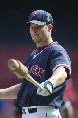 BOSTON - APRIL 14: Third baseman Shea Hillenbrand #29 of the Boston Red Sox takes a warm up swing before the MLB game against the New York Yankees at Fenway Park in Boston, Massachusetts on April 14, 2002. The Yankees won 6-2. (Photo by Al Bello/Getty Im